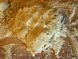 Unbaked raw yeast bread dough expanding